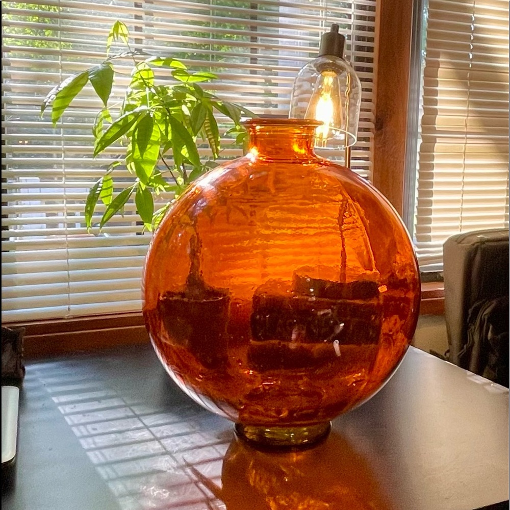 Giant round orange glass vase
